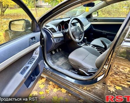 Чорний Міцубісі Lancer, об'ємом двигуна 2 л та пробігом 245 тис. км за 5500 $, фото 10 на Automoto.ua