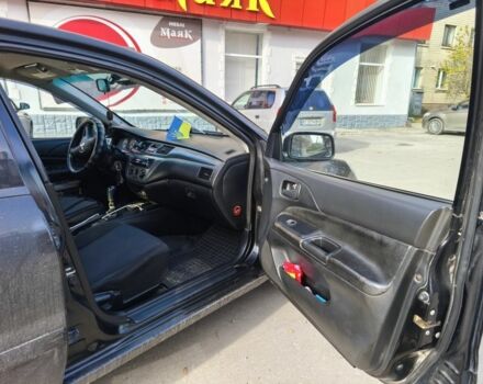 Черный Мицубиси Лансер, объемом двигателя 1.6 л и пробегом 358 тыс. км за 4300 $, фото 2 на Automoto.ua