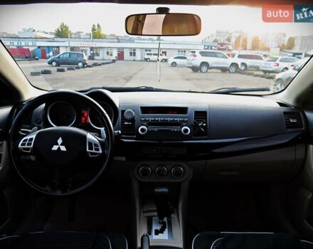 Мицубиси Лансер 2008 в Черкассах на Automoto.ua Черный Мицубиси Лансер, объемом двигателя 2 л и пробегом 178 тыс. км за 7400 $, фото 15 на Automoto.ua