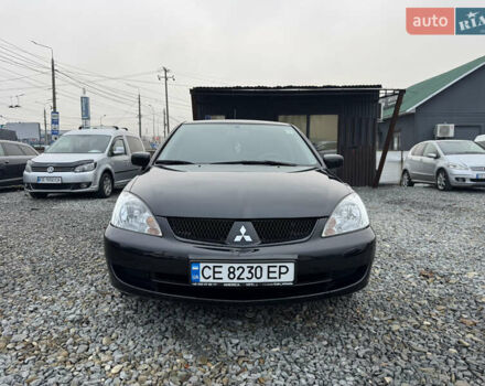 Черный Мицубиси Лансер, объемом двигателя 1.58 л и пробегом 202 тыс. км за 4100 $, фото 23 на Automoto.ua