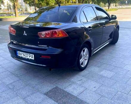 Чорний Міцубісі Lancer, об'ємом двигуна 2 л та пробігом 220 тис. км за 6300 $, фото 3 на Automoto.ua