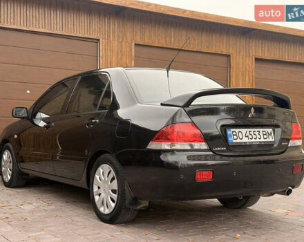 Чорний Міцубісі Lancer, об'ємом двигуна 1.6 л та пробігом 265 тис. км за 4700 $, фото 10 на Automoto.ua