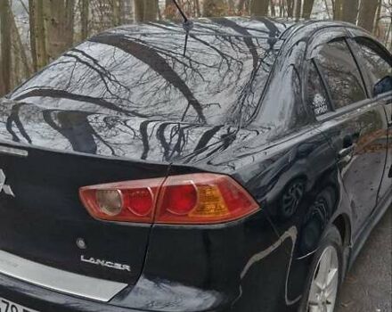 Чорний Міцубісі Lancer, об'ємом двигуна 2 л та пробігом 302 тис. км за 7200 $, фото 5 на Automoto.ua