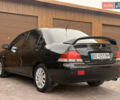 Чорний Міцубісі Lancer, об'ємом двигуна 1.6 л та пробігом 265 тис. км за 4700 $, фото 10 на Automoto.ua