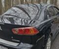 Чорний Міцубісі Lancer, об'ємом двигуна 2 л та пробігом 302 тис. км за 7200 $, фото 5 на Automoto.ua
