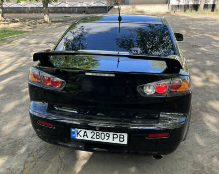 Чорний Міцубісі Lancer, об'ємом двигуна 2 л та пробігом 292 тис. км за 6650 $, фото 5 на Automoto.ua