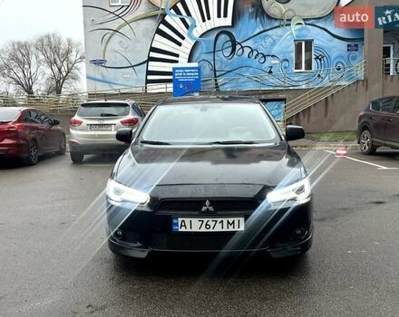 Черный Мицубиси Лансер, объемом двигателя 2 л и пробегом 217 тыс. км за 7000 $, фото 27 на Automoto.ua