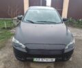 Чорний Міцубісі Lancer, об'ємом двигуна 1 л та пробігом 400 тис. км за 4700 $, фото 1 на Automoto.ua