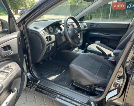 Чорний Міцубісі Lancer, об'ємом двигуна 1.6 л та пробігом 296 тис. км за 4200 $, фото 31 на Automoto.ua
