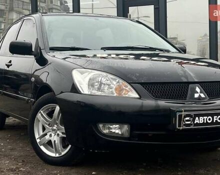 Чорний Міцубісі Lancer, об'ємом двигуна 1.6 л та пробігом 340 тис. км за 6190 $, фото 1 на Automoto.ua