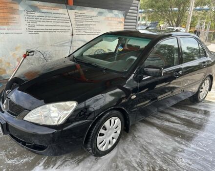Чорний Міцубісі Lancer, об'ємом двигуна 1.6 л та пробігом 250 тис. км за 3900 $, фото 1 на Automoto.ua