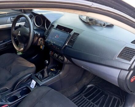 Черный Мицубиси Лансер, объемом двигателя 1.5 л и пробегом 270 тыс. км за 4400 $, фото 10 на Automoto.ua