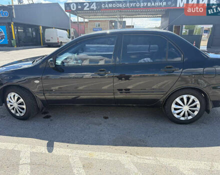 Чорний Міцубісі Lancer, об'ємом двигуна 1.6 л та пробігом 292 тис. км за 3600 $, фото 3 на Automoto.ua