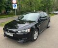 Чорний Міцубісі Lancer, об'ємом двигуна 2 л та пробігом 271 тис. км за 5800 $, фото 1 на Automoto.ua