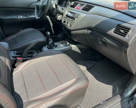 Чорний Міцубісі Lancer, об'ємом двигуна 1.6 л та пробігом 296 тис. км за 4200 $, фото 44 на Automoto.ua