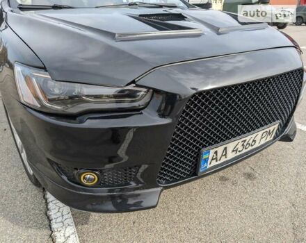 Чорний Міцубісі Lancer, об'ємом двигуна 2 л та пробігом 240 тис. км за 10500 $, фото 3 на Automoto.ua