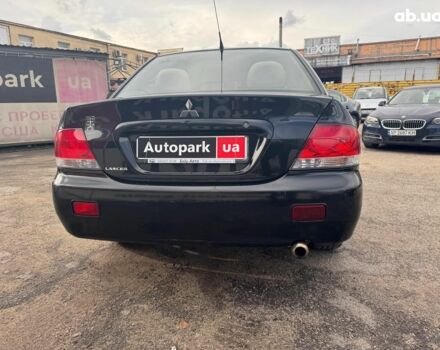 Мицубиси Лансер 2008 в Запорожье на Automoto.ua Черный Мицубиси Лансер, объемом двигателя 1.6 л и пробегом 316 тыс. км за 4290 $, фото 5 на Automoto.ua