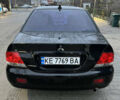 Чорний Міцубісі Lancer, об'ємом двигуна 1.6 л та пробігом 277 тис. км за 3900 $, фото 8 на Automoto.ua