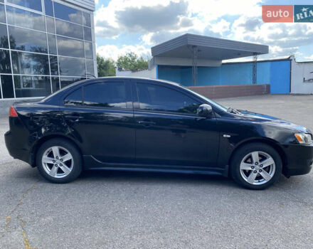 Черный Мицубиси Лансер, объемом двигателя 2 л и пробегом 200 тыс. км за 5500 $, фото 2 на Automoto.ua