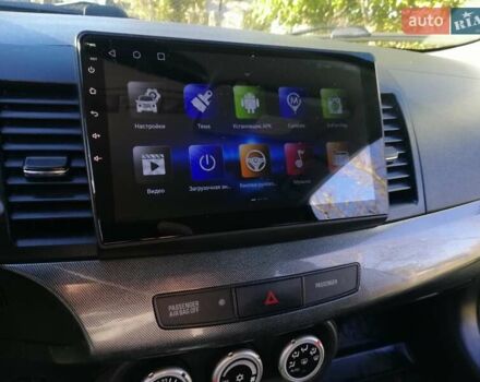 Мицубиси Лансер 2008 в Киеве на Automoto.ua Черный Мицубиси Лансер, объемом двигателя 2 л и пробегом 196 тыс. км за 5500 $, фото 12 на Automoto.ua