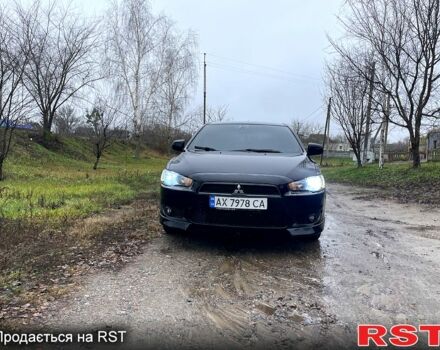 Черный Мицубиси Лансер, объемом двигателя 2 л и пробегом 226 тыс. км за 6600 $, фото 8 на Automoto.ua