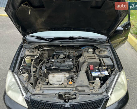 Чорний Міцубісі Lancer, об'ємом двигуна 1.58 л та пробігом 192 тис. км за 4500 $, фото 20 на Automoto.ua