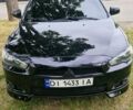 Чорний Міцубісі Lancer, об'ємом двигуна 2 л та пробігом 190 тис. км за 8000 $, фото 7 на Automoto.ua