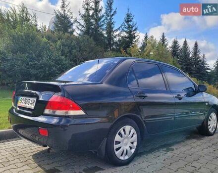 Міцубісі Lancer 2008 у Тернополі на Automoto.ua Чорний Міцубісі Lancer, об'ємом двигуна 1.58 л та пробігом 182 тис. км за 5600 $, фото 10 на Automoto.ua