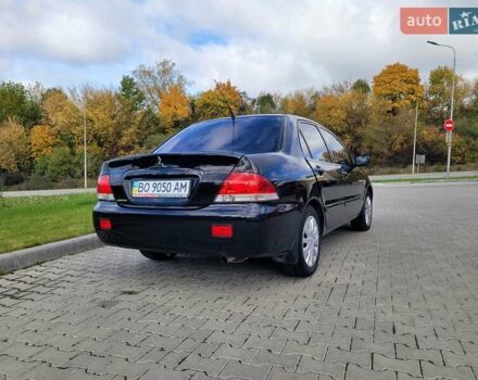 Міцубісі Lancer 2008 у Тернополі на Automoto.ua Чорний Міцубісі Lancer, об'ємом двигуна 1.58 л та пробігом 182 тис. км за 5600 $, фото 4 на Automoto.ua