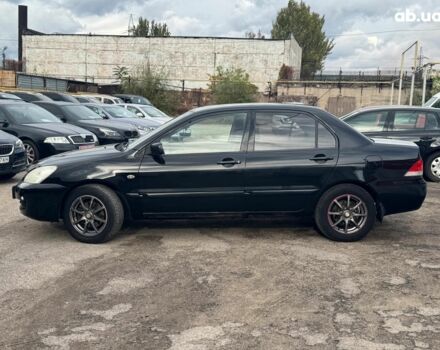 Мицубиси Лансер 2008 в Запорожье на Automoto.ua Черный Мицубиси Лансер, объемом двигателя 1.6 л и пробегом 316 тыс. км за 4290 $, фото 3 на Automoto.ua