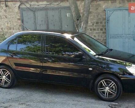 Чорний Міцубісі Lancer, об'ємом двигуна 1.6 л та пробігом 55 тис. км за 6500 $, фото 6 на Automoto.ua