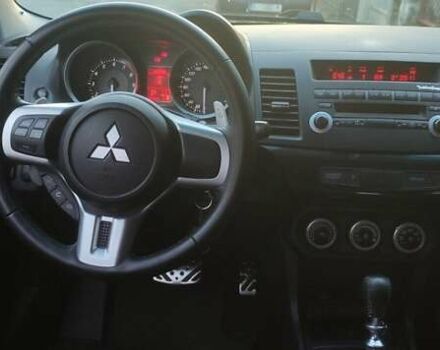 Чорний Міцубісі Lancer, об'ємом двигуна 2 л та пробігом 134 тис. км за 29034 $, фото 11 на Automoto.ua