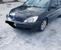Черный Мицубиси Лансер, объемом двигателя 1.6 л и пробегом 245 тыс. км за 3800 $, фото 1 на Automoto.ua