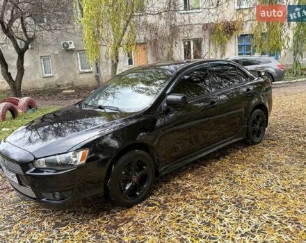 Черный Мицубиси Лансер, объемом двигателя 2 л и пробегом 260 тыс. км за 6100 $, фото 8 на Automoto.ua