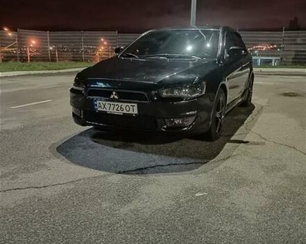 Черный Мицубиси Лансер, объемом двигателя 2 л и пробегом 240 тыс. км за 6400 $, фото 2 на Automoto.ua