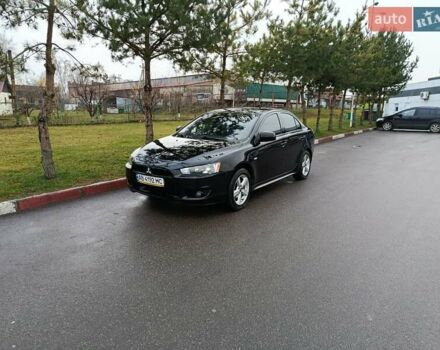Черный Мицубиси Лансер, объемом двигателя 2 л и пробегом 200 тыс. км за 5100 $, фото 4 на Automoto.ua
