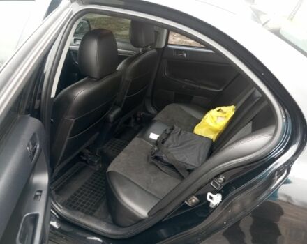 Чорний Міцубісі Lancer, об'ємом двигуна 2 л та пробігом 232 тис. км за 5000 $, фото 3 на Automoto.ua