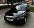Черный Мицубиси Лансер, объемом двигателя 2 л и пробегом 284 тыс. км за 4999 $, фото 1 на Automoto.ua