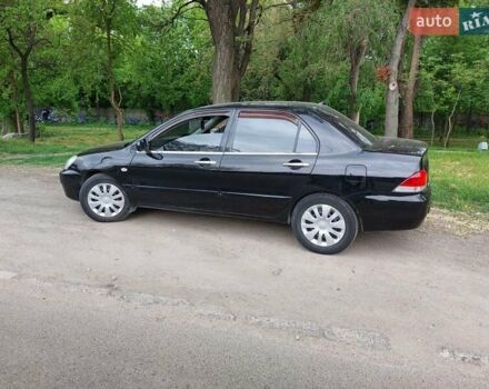 Чорний Міцубісі Lancer, об'ємом двигуна 1.6 л та пробігом 215 тис. км за 4900 $, фото 2 на Automoto.ua