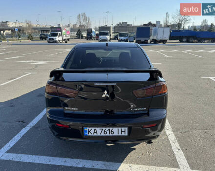 Чорний Міцубісі Lancer, об'ємом двигуна 2 л та пробігом 286 тис. км за 6450 $, фото 9 на Automoto.ua