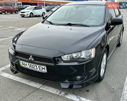 Чорний Міцубісі Lancer, об'ємом двигуна 2 л та пробігом 199 тис. км за 7900 $, фото 1 на Automoto.ua