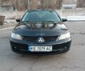 Черный Мицубиси Лансер, объемом двигателя 1.6 л и пробегом 180 тыс. км за 4699 $, фото 1 на Automoto.ua
