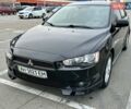 Чорний Міцубісі Lancer, об'ємом двигуна 2 л та пробігом 199 тис. км за 7900 $, фото 1 на Automoto.ua