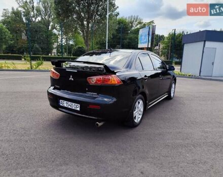 Чорний Міцубісі Lancer, об'ємом двигуна 2 л та пробігом 175 тис. км за 7800 $, фото 5 на Automoto.ua