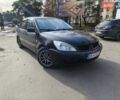 Черный Мицубиси Лансер, объемом двигателя 1.6 л и пробегом 358 тыс. км за 4300 $, фото 1 на Automoto.ua