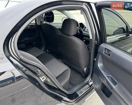 Чорний Міцубісі Lancer, об'ємом двигуна 2 л та пробігом 199 тис. км за 7900 $, фото 23 на Automoto.ua