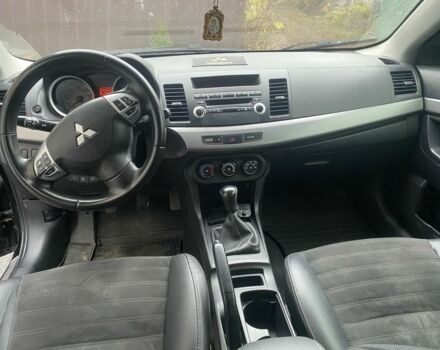 Черный Мицубиси Лансер, объемом двигателя 2 л и пробегом 190 тыс. км за 3100 $, фото 9 на Automoto.ua