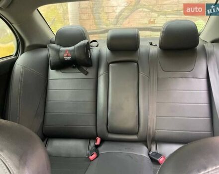 Чорний Міцубісі Lancer, об'ємом двигуна 2 л та пробігом 255 тис. км за 6999 $, фото 8 на Automoto.ua