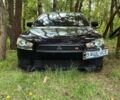 Чорний Міцубісі Lancer, об'ємом двигуна 1.47 л та пробігом 250 тис. км за 5250 $, фото 1 на Automoto.ua