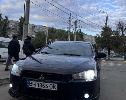 Черный Мицубиси Лансер, объемом двигателя 2 л и пробегом 222 тыс. км за 6000 $, фото 10 на Automoto.ua